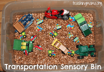 Transportation Sensory Bin filled with Beans and Trucks 